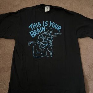 Black Tee with Blue Graphic Design and Red Graphic on Back